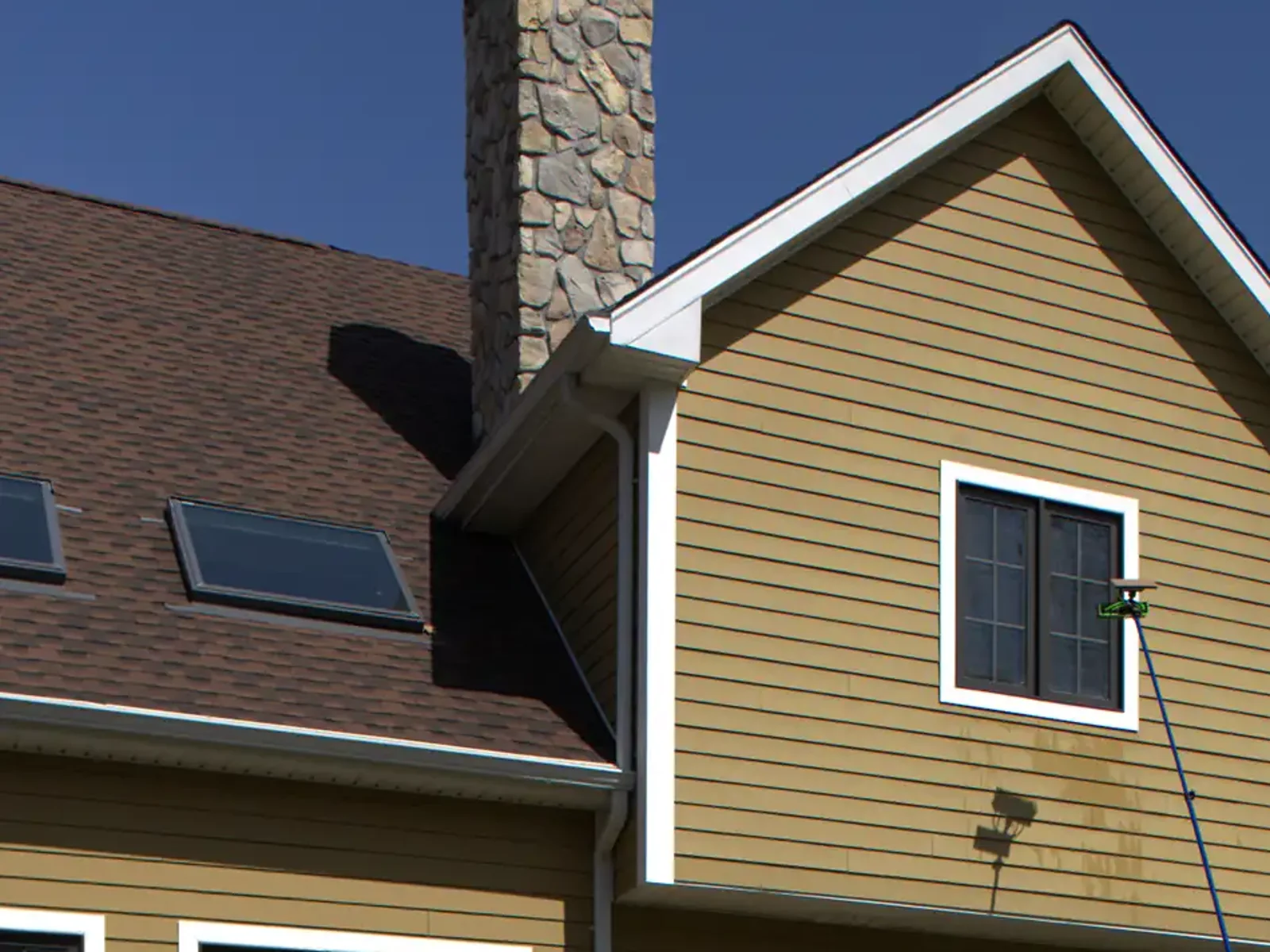 Finished Westchester home with spotless upper-storey glass and clean siding
