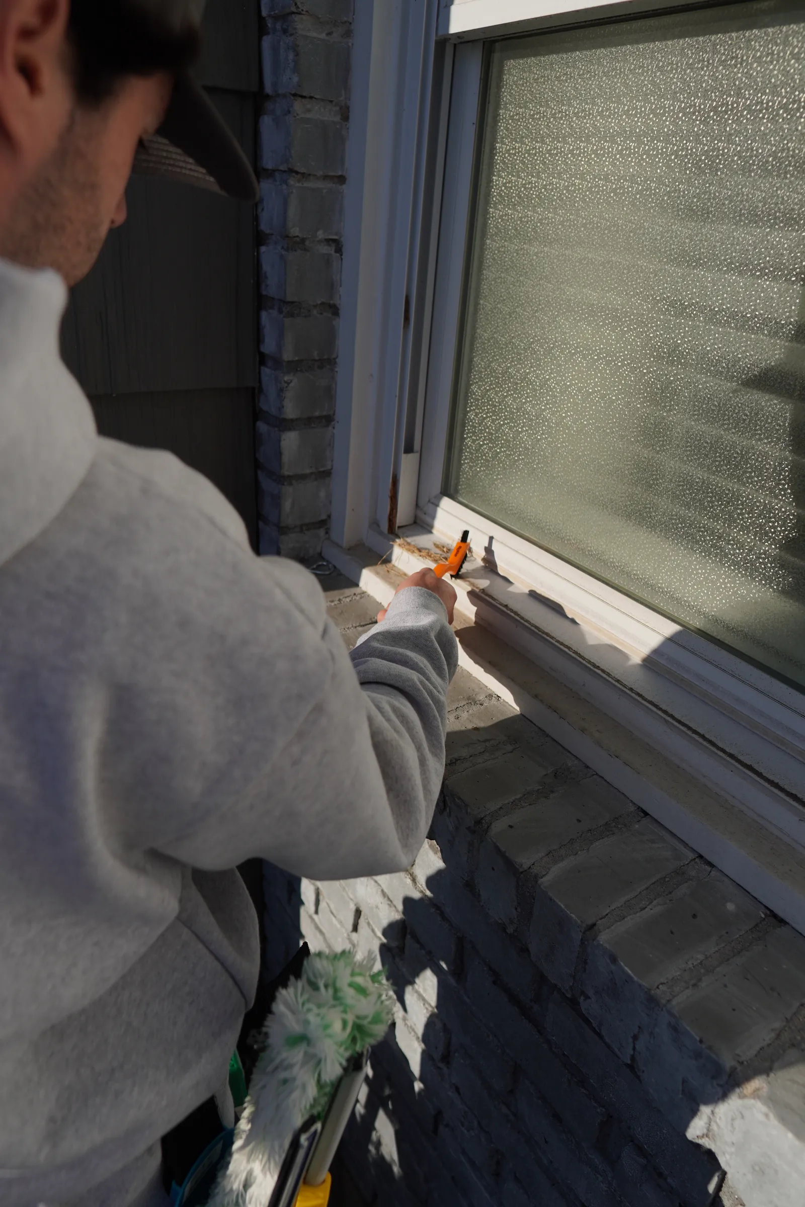 Window screen scrubbed in place during a Tiger Clean visit