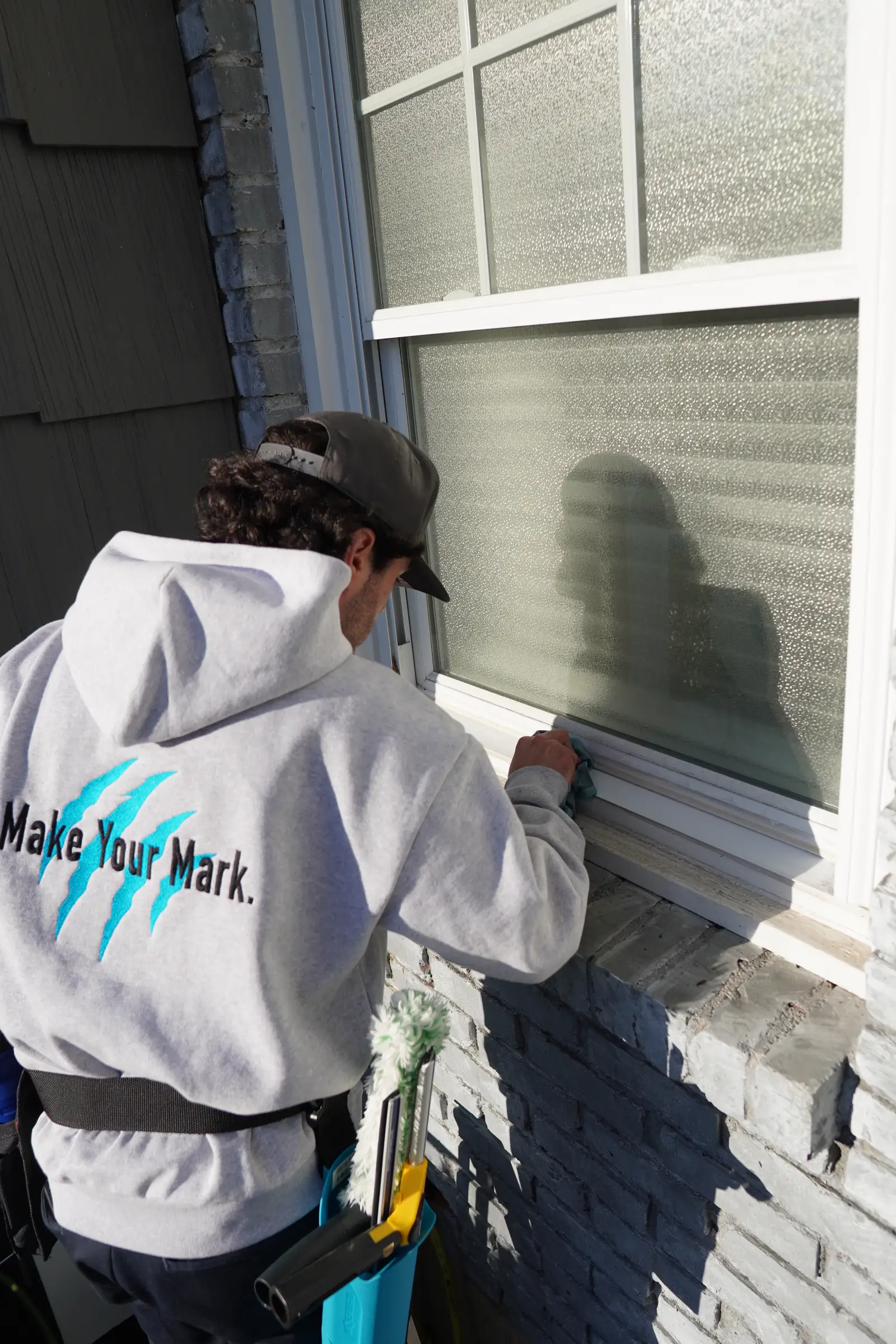 Window screen washed and rinsed during a Tiger Clean visit